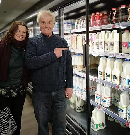 milk in fridge in shop